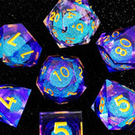 Aurora liquid-core RPG dice set with blue-purple shimmer and gold numbers on black.